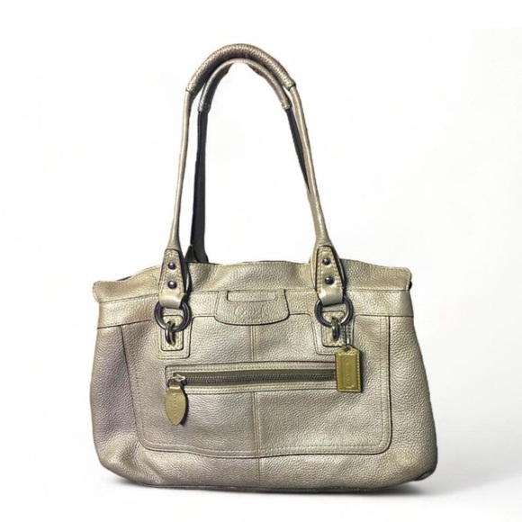 Coach Handbags - COACH - Penelope No F14686
Pebbled Gold leather handbag
Purple Interior